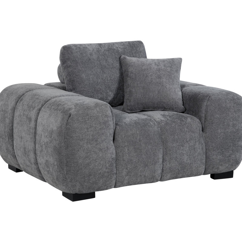 Fauteuil d'appoint gris anthracite gris anthracite avec capitonnage à canaux verticaux profonds et siège confortable pour une détente à long terme. Siège large rembourré