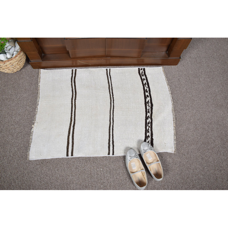 Tapis de porte turc chic fabriqué à la main dans des rayures crème et brunes pour un décor de vestibule bohémien