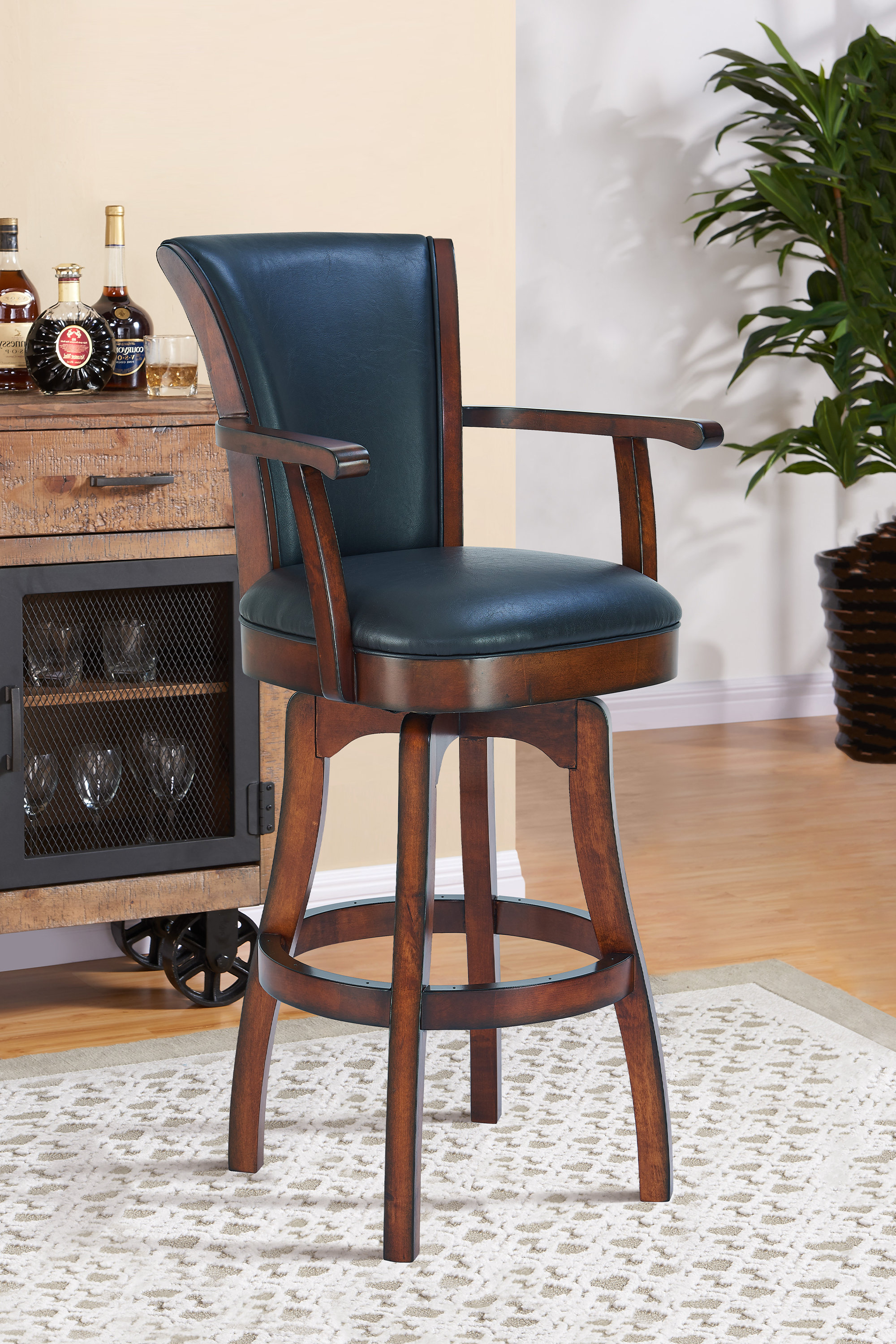 Alcott Hill® Shockley Swivel Barstool with Arms in Wood and Faux
