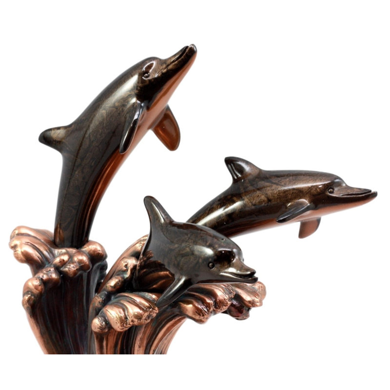 Figurine à trois bottlenoses de dauphins avec des ondes de l’océan Jayla