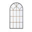 Miroir arqué de 34 po x 65,5 po au design noir et doré pour les espaces de vie, faisant une déclaration audacieuse reflétant l'élégance