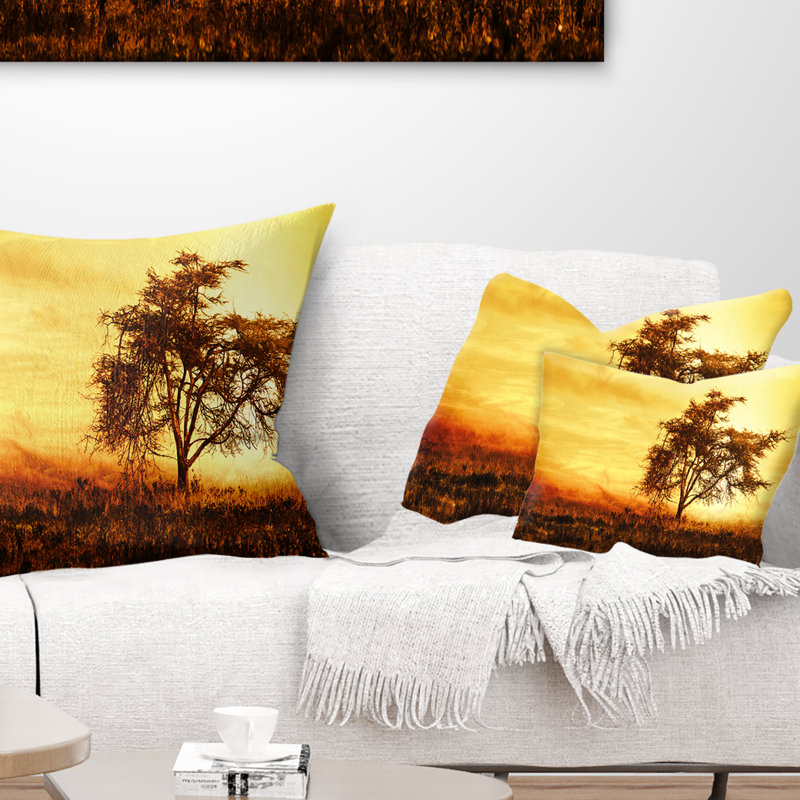 Coussin décoratif à imprimé silhouette d'arbre africain
