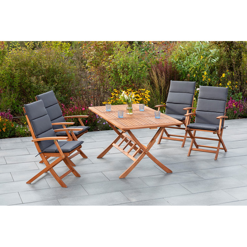 Choteau 4 - Person Eucalyptus Solid Wood Patio Dining Set Rectangular Table with Cushions Included