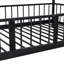 Lit superposé convertible simple au-dessus d'un lit simple, structure en métal noir classique avec garde-corps et glissade pour chambres d'enfant