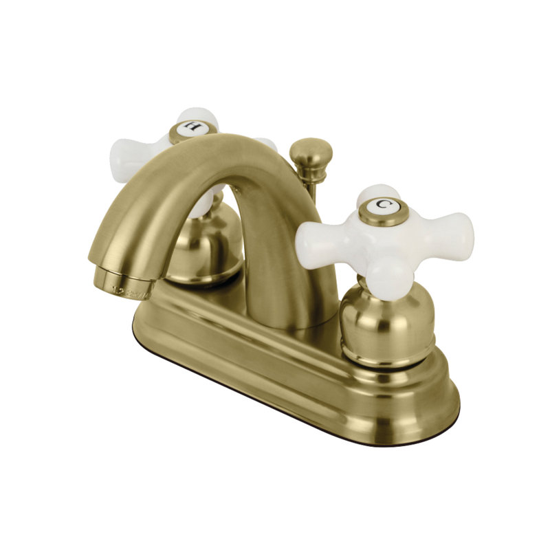 Kingston Brass Restoration Two-Handle 3-Hole Deck Mount 4" Centerset Bathroom Faucet with Plastic Pop-Up, Polished Chrome
