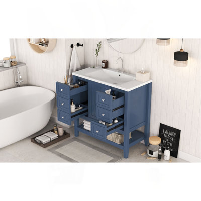 Meuble-lavabo élégant avec lavabo, tiroirs et armoire pour un décor de salle de bain fonctionnel et élégant.