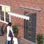 Wall-mounted window and door awnings for masonry and concrete walls-988616143-988616142