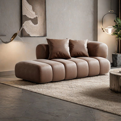 Chaise longue rembourrée à large siège