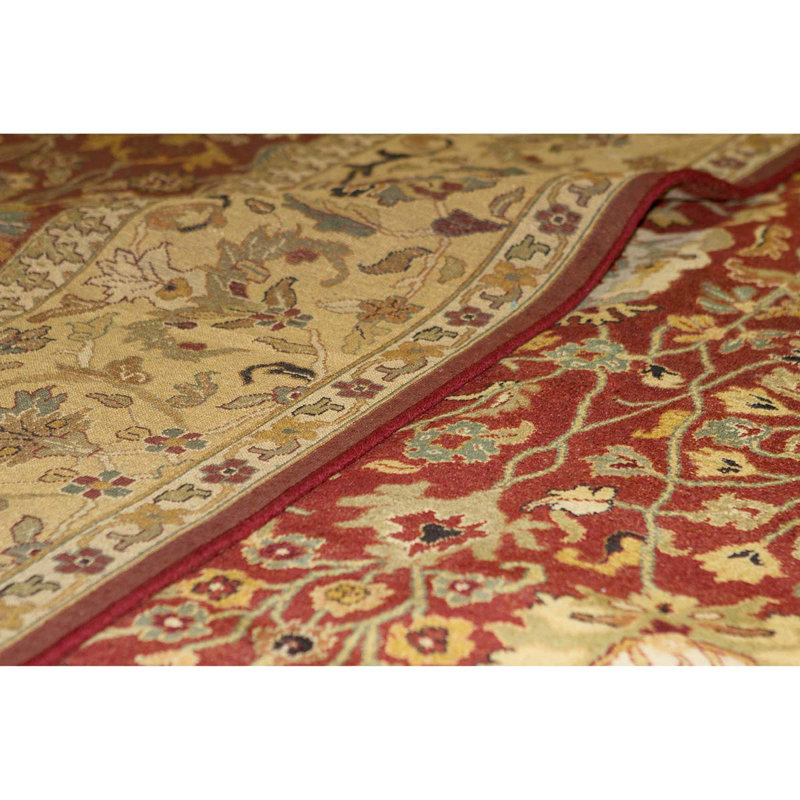 Tapis rouge et or de haute qualité noué à la main