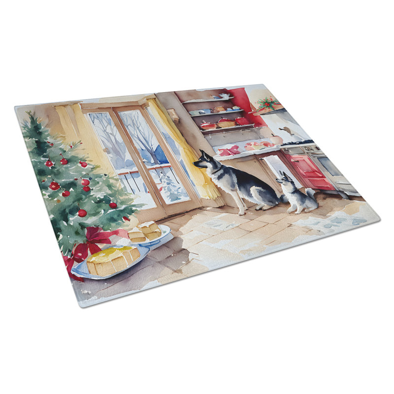 Planche à découper en verre avec des biscuits de Noël norvégien