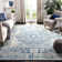 Bryker Persian Ivory/Blue Area Rug