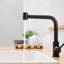 Robinet d'évier de cuisine noir moderne avec douchette extractible en céramique pour un rinçage facile de la barre pivotante à 360 ° de conception contemporaine