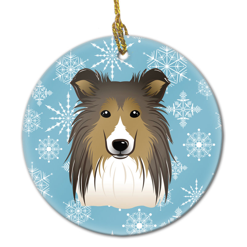 Ornement figurine suspendu en céramique flocon de neige sheltie