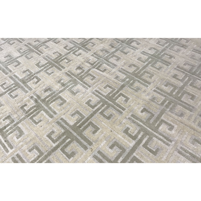 Tapis ivoire et taupe noué à la main de haute qualité