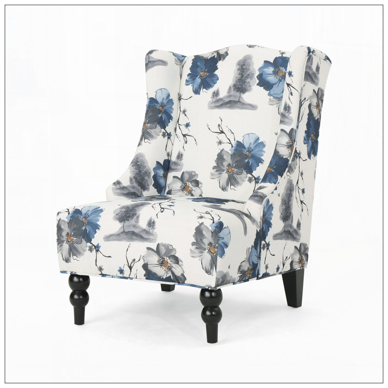 Fauteuil club en tissu à haut dossier