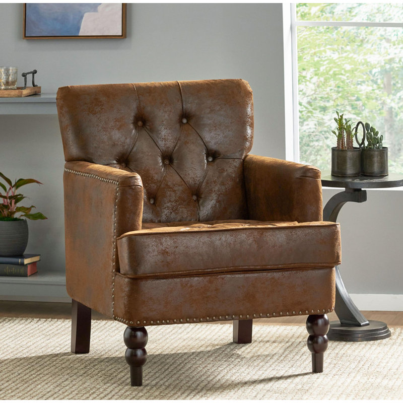 Élégance intemporelle: le fauteuil club capitonné - un ajout classique à votre espace de vie
