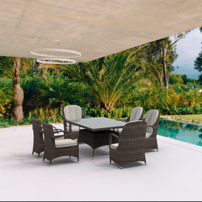 Algird 6 - Person Wicker Patio Dining Set with Rectangular Table , Cushions Included, Brown