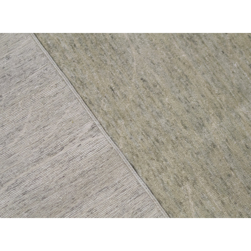 Tapis vert noué à la main de haute qualité