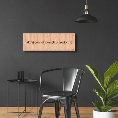 «Take Care of Yourself is Productive» par Yass Naffas Designs, art mural en verre acrylique
