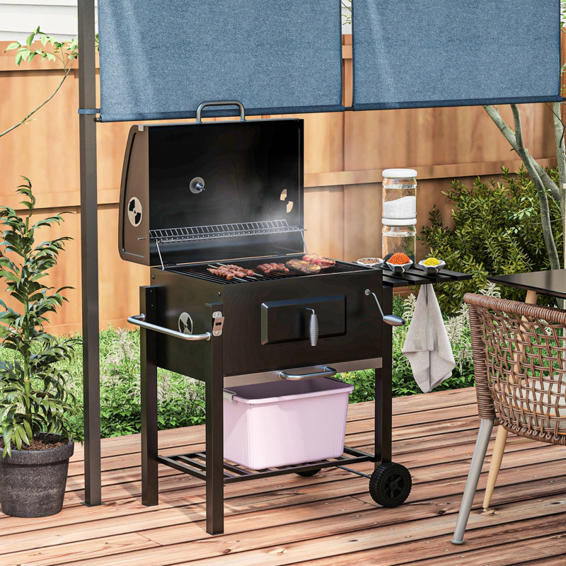Barbecue au charbon de bois, cuiseur d'extérieur portatif pour le camping et les fêtes dans la cour. Surface de cuisson de 21,75 po x 16,5 po, table d'appoint, tablette inférieure, roulettes, poignée, noir. Diffusion optimale de la chaleur avec régla