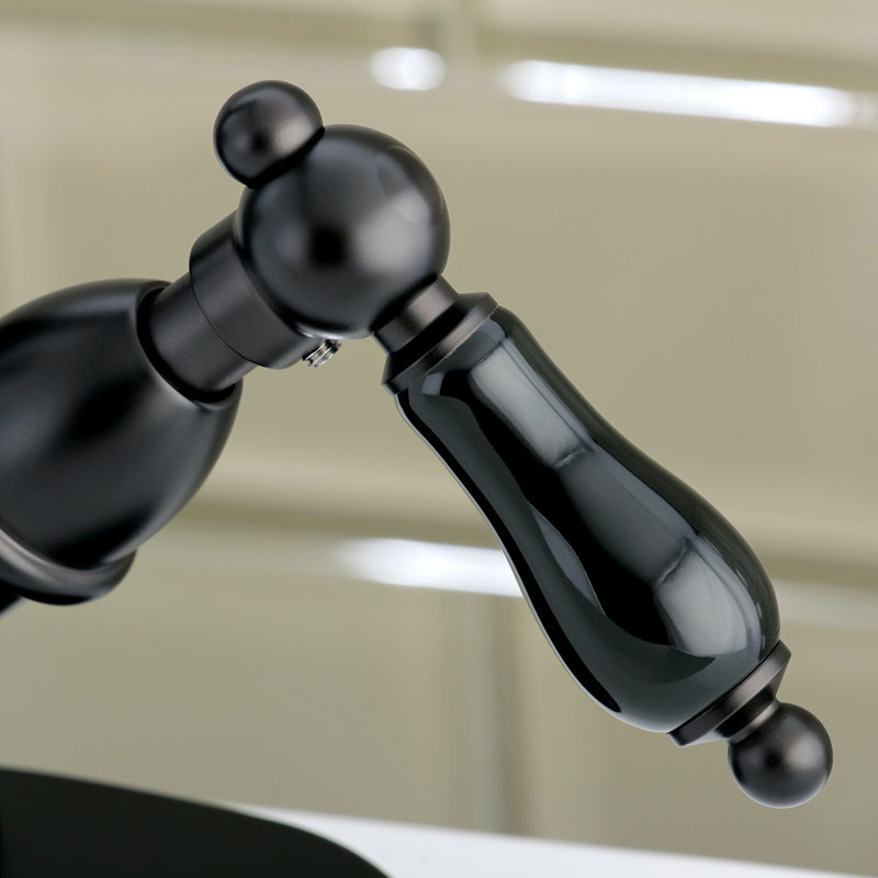 Kingston Brass Duchess Two-Handle 1-or-3 Hole Deck Mount Bathroom Faucet with Brass Pop-Up, Oil Rubbed Bronze