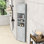 Grande armoire de coin autoportante Vanbrunt avec tablettes réglables et portes à motif rainuré