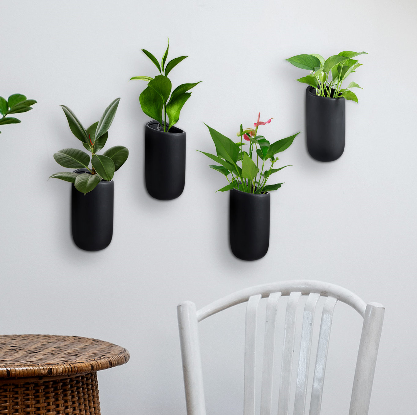 Ebern Designs Starbella Cylindrical Ceramic Wall Planter (Set of 4)