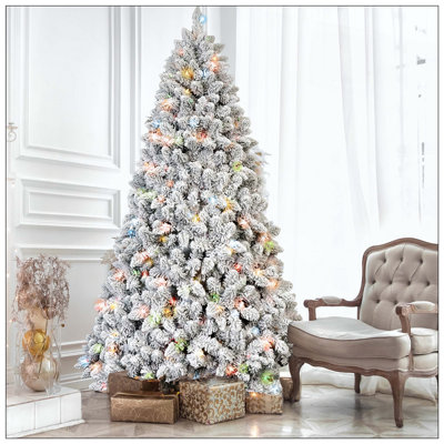 Arbre de Noël floqué avec 150 lumières UL colorées et 21 pommes de pin naturelles - 366 pointes en PVC enneigées, branches articulées, support en métal stable, installation facile