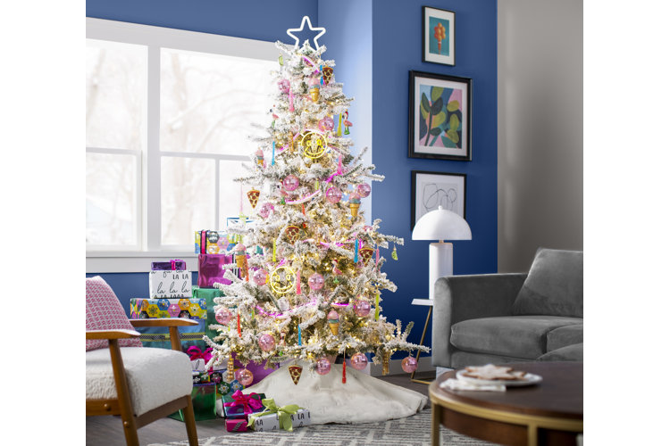 white christmas tree with beautiful metallic christmas decorations