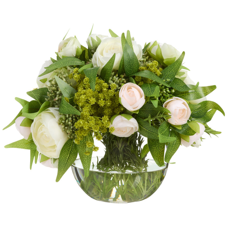 Renoncule / viorne / ruscus dans un vase en verre crème pêche