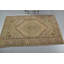 Tapis turc à motif géométrique de style rétro dans des tons de rose doux