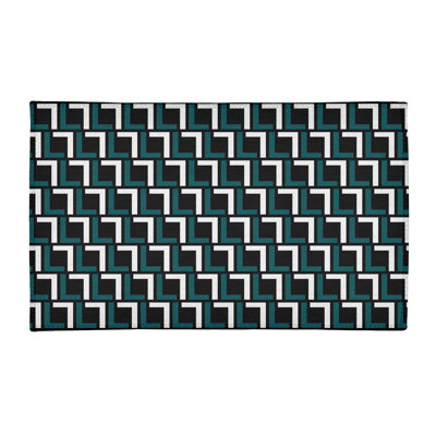 Tapis rond noir / vert à motif géométrique