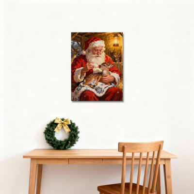 Père Noël tenant un cerf sur toile