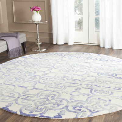 Tapis ivoire / bleu en laine touffeté à la main Carter