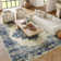 Burnie Oriental Blue/Ivory Area Rug