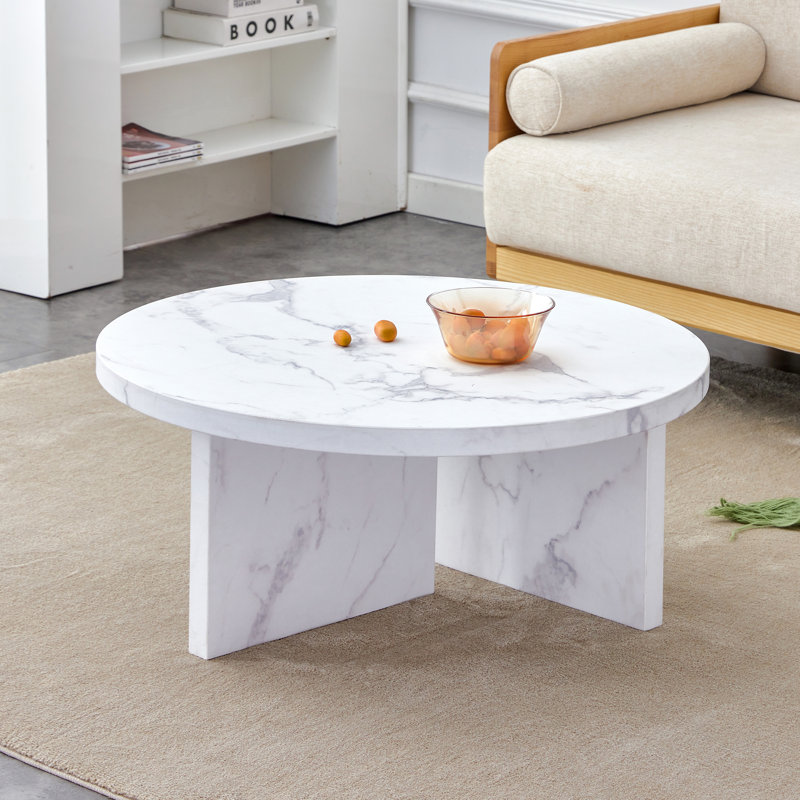 Une table basse à motif circulaire en matériau MDF, une table centrale de 31,4 pouces et une table basse moderne