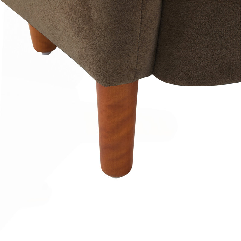 Fauteuil club à oreilles rembourré