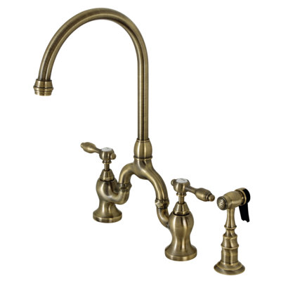 Kingston Brass Tudor Two-Handle 3-Hole Deck Mount Bridge Kitchen Faucet with Brass Side Sprayer