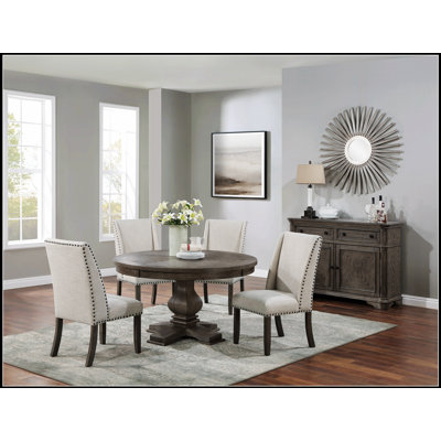 Traditional Formal Five Piece Dining Set With Round Pedestal Table And Wingback Upholstered Chairs For Elegant Gatherings