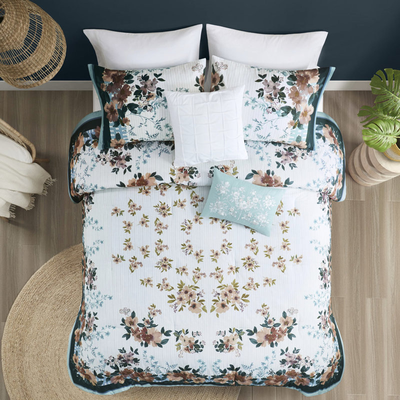 Édredon double / grand avec bordures de couleur sarcelle et coussins décoratifs à imprimé floral