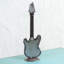 Sculpture recyclée gloire de guitare Frick