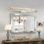 Applique murale à DEL de 25 po en acier inoxydable chromé et cristal pour salle de bain