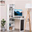 Un poste de travail familial multifonctionnel avec une armoire de bureau murale qui se plie et se transforme, avec un tableau noir et des tablettes latérales