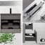 Meuble-lavabo suspendu de 61 cm (24 po), lavabo en quartz noir sable, armoire gris ciment, tiroirs à fermeture amortie, esthétique moderne, gain de place, installation facile, construction robuste, rangement de l'eau, finition élégante.