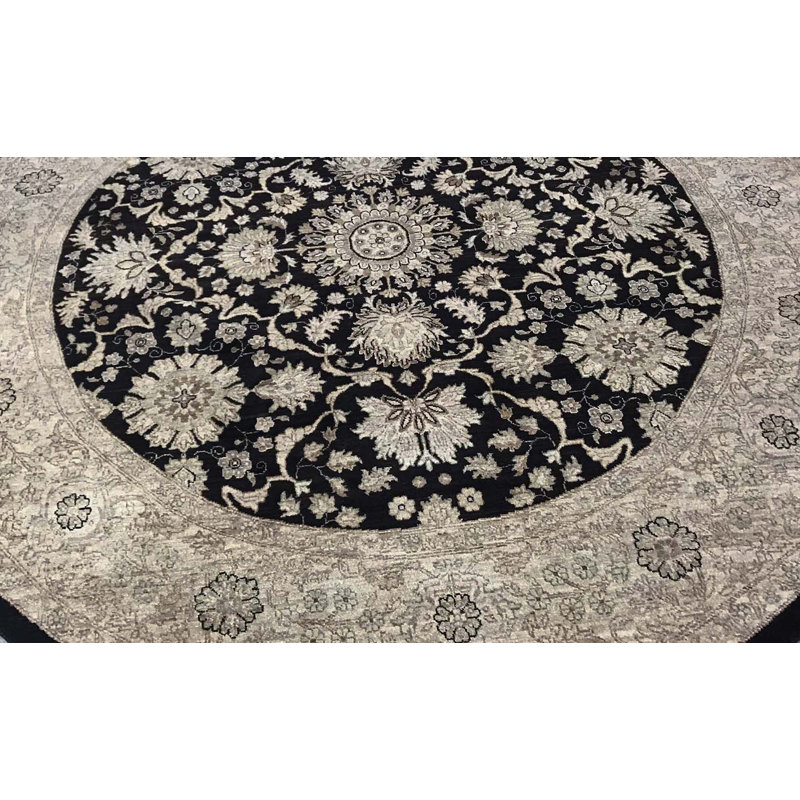 Tapis rond noir et crème de haute qualité noué à la main