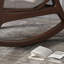 Chaise berçante moderne en bois massif rembourré