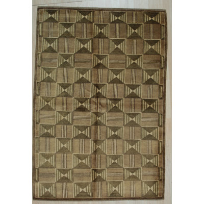 Ahtziry Brown Hand Knotted Wool Area Rug
