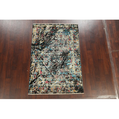 Tapis rectangulaire ivoire / noir / bleu / gris noué à la main 4 pi 1 po x 6 pi 1 po