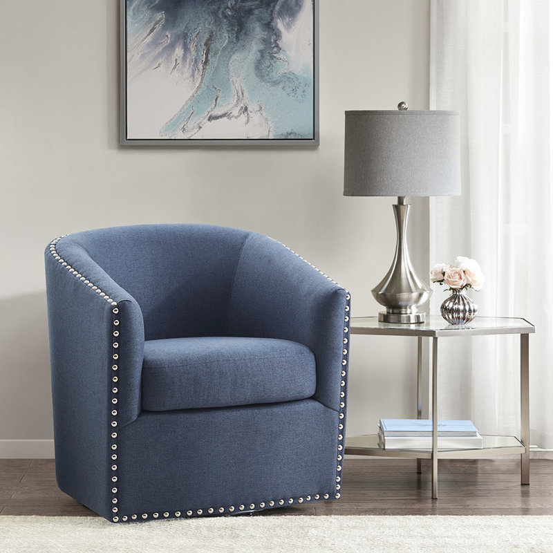 Fauteuil pivotant bleu, avec un élégant clou argenté et un rembourrage en mousse à base noire en métal