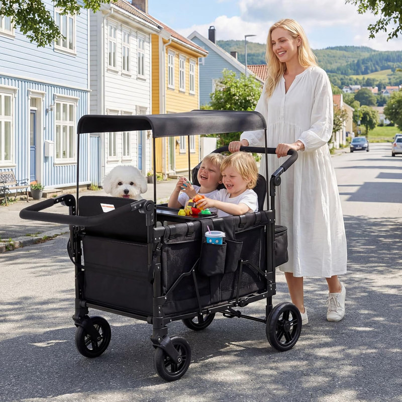 Poussette pour enfants 4 places, roues tout-terrain avec harnais de sécurité, auvent amovible et plateau à collation, roues pivotantes / fixes avec frein à une étape, noir, utilisation familiale en plein air